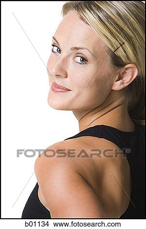 Profile of a young woman smiling View Large Photo Image Picture - Profile of a young woman smiling. Fotosearch