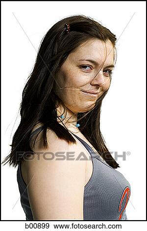 Profile of a young woman smiling View Large Photo Image Stock Photo - Profile of a young woman smiling. Fotosearch