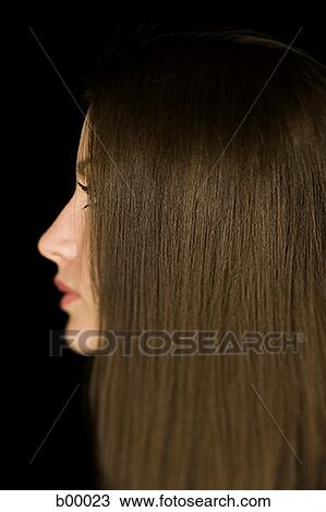 Profile of a young woman's face View Large Photo Image Stock Image - Profile of a young woman's face. Fotosearch