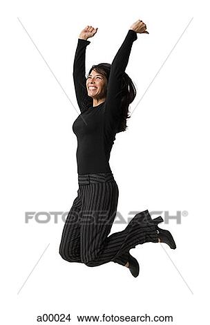 Profile of an adult Hispanic woman jumping View Large Photo Image Picture - Profile of an adult Hispanic woman jumping. Fotosearch