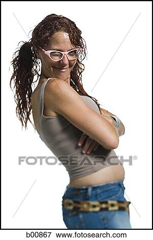Stock Photo - Profile of an adult woman standing with her arms crossed. Fotosearch