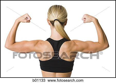 Rear view of a young woman flexing her muscles View Large Photo Image Stock Image - Rear view of a young woman flexing her muscles. Fotosearch