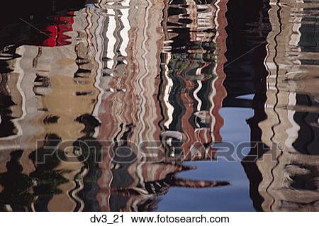 Stock Image - Reflection of a building on water. Fotosearch
