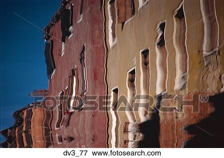 Reflection of buildings on water View Large Photo Image Stock Photo - Reflection of buildings on water. Fotosearch