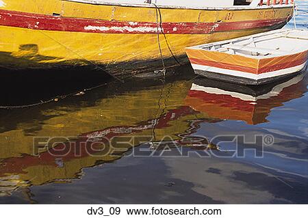 Reflection of two boats in a river View Large Photo Image Stock Photo - Reflection of two boats in a river. Fotosearch