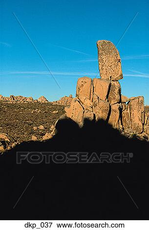 Rock formation in a desert View Large Photo Image Stock Photo - Rock formation in a desert. Fotosearch