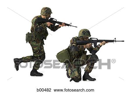 Side profile of two soldiers aiming their rifles View Large Photo Image Stock Image - Side profile of two soldiers aiming their rifles. Fotosearch