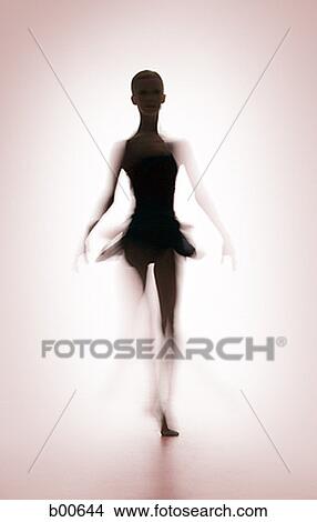 Silhouette of a female ballerina standing View Large Photo Image Picture - Silhouette of a female ballerina standing. Fotosearch