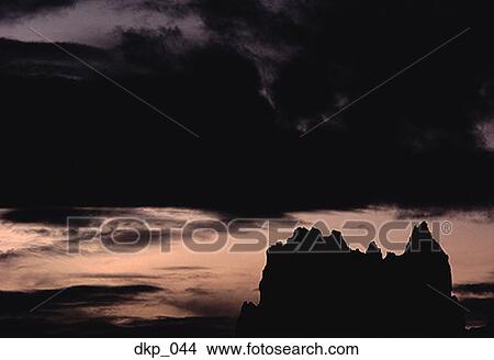 Silhouette of a rock formation View Large Photo Image Picture - Silhouette of a rock formation. Fotosearch
