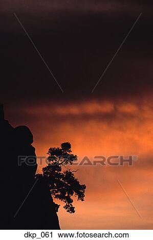Stock Image - Silhouette of a rock formation. Fotosearch