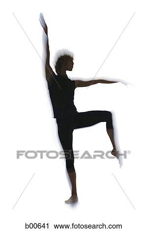 Silhouette of a young man standing on one leg View Large Photo Image Stock Image - Silhouette of a young man standing on one leg. Fotosearch