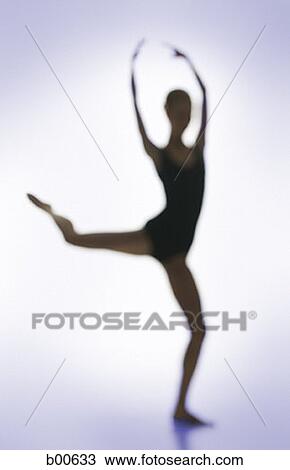 Silhouette of a young woman standing on one leg View Large Photo Image Stock Image - Silhouette of a young woman standing on one leg. Fotosearch