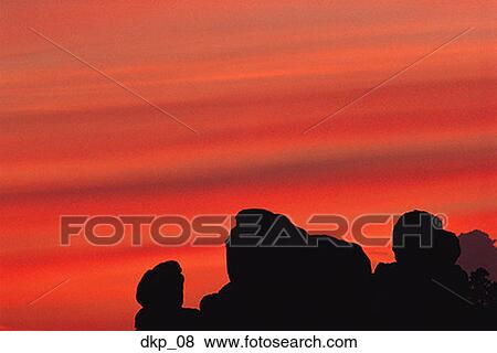 Silhouette of rock formations at dusk View Large Photo Image Stock Photo - Silhouette of rock formations at dusk. Fotosearch