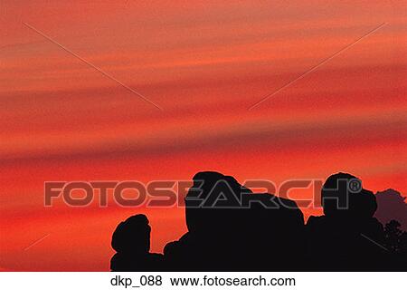 Silhouette of rock formations at dusk View Large Photo Image Stock Photo - Silhouette of rock formations at dusk. Fotosearch