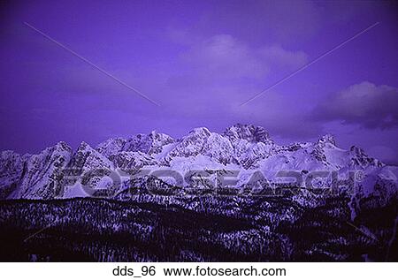 Snow covered mountain range View Large Photo Image Stock Photograph - Snow covered mountain range. Fotosearch