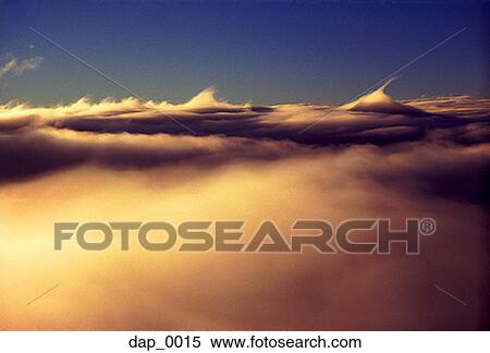 Storm clouds in a blue sky View Large Photo Image Stock Photography - Storm clouds in a blue sky. Fotosearch