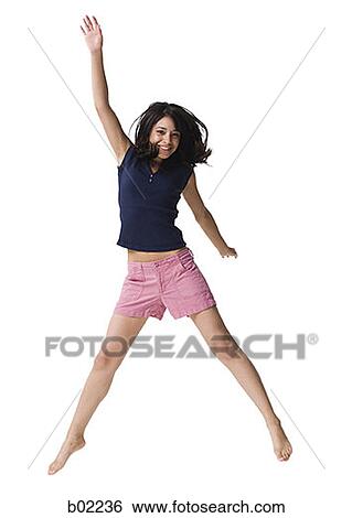 Teenage girl jumping View Large Photo Image Stock Photograph - Teenage girl jumping. Fotosearch