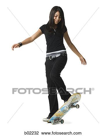 Teenage girl riding a skateboard View Large Photo Image Stock Image - Teenage girl riding a skateboard. Fotosearch