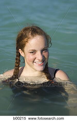 Teenage girl, swimming View Large Photo Image Stock Photography - Teenage girl, swimming. Fotosearch