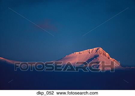 Top of a snow covered mountain View Large Photo Image Stock Image - Top of a snow covered mountain. Fotosearch