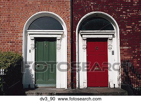 Two colored doors on the front of a building View Large Photo Image Stock Image - Two colored doors on the front of a building. Fotosearch
