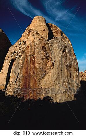 Two people climbing a rock face View Large Photo Image Stock Image - Two people climbing a rock face. Fotosearch