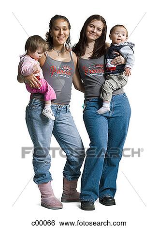 Two young women carrying their babies View Large Photo Image Stock Photograph - Two young women carrying their babies. Fotosearch