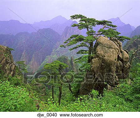 View of a boulder and mountain range View Large Photo Image Stock Image - View of a boulder and mountain range. Fotosearch