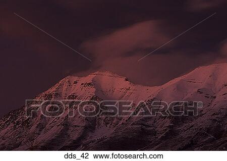 View of a snow covered mountain View Large Photo Image Stock Image - View of a snow covered mountain. Fotosearch