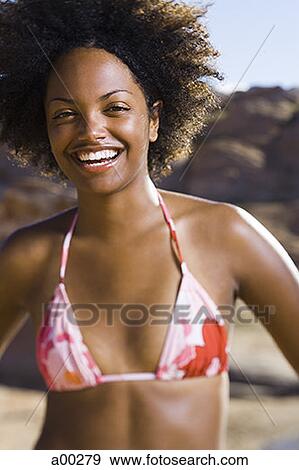 Young African-American woman smiling View Large Photo Image Stock Photo - Young African-American woman smiling. Fotosearch
