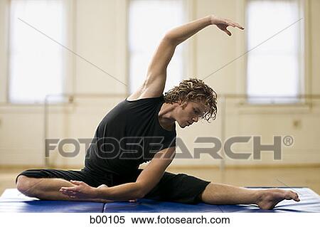 Young man exercising View Large Photo Image Stock Photography - Young man exercising. Fotosearch