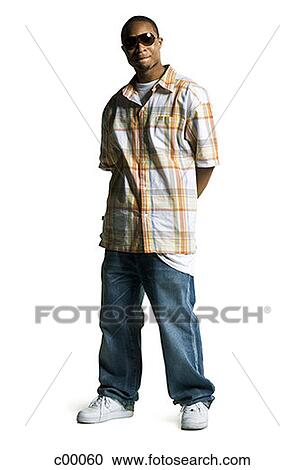 Young man wearing sunglasses View Large Photo Image Stock Image - Young man wearing sunglasses. Fotosearch
