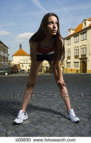 Young woman exercising View Large Photo Image Stock Image - Young woman exercising. Fotosearch