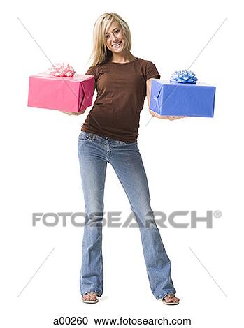 Young woman holding gifts View Large Photo Image Stock Image - Young woman holding gifts. Fotosearch