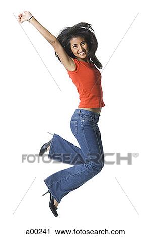 Young woman jumping View Large Photo Image Stock Image - Young woman jumping . Fotosearch