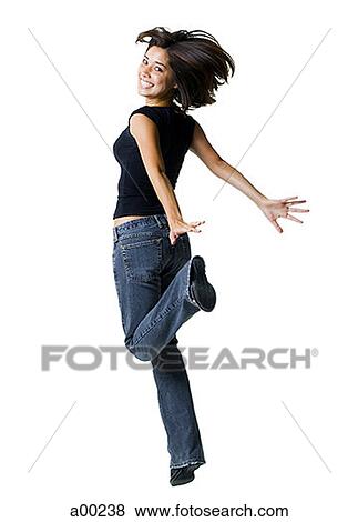 Young woman jumping View Large Photo Image Stock Photo - Young woman jumping. Fotosearch
