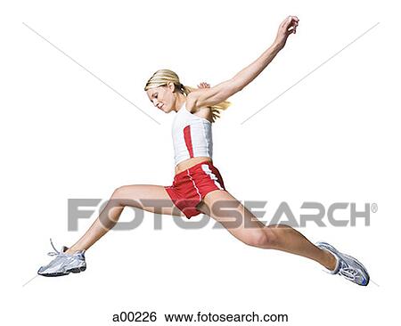 Young woman jumping View Large Photo Image Stock Photograph - Young woman jumping. Fotosearch