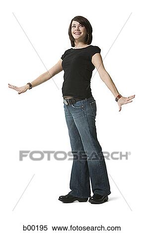 Stock Photography - Young woman standing and gesturing. Fotosearch