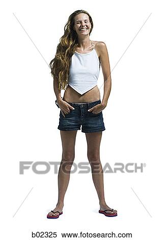 Young woman standing and smiling View Large Photo Image Stock Photography - Young woman standing and smiling. Fotosearch