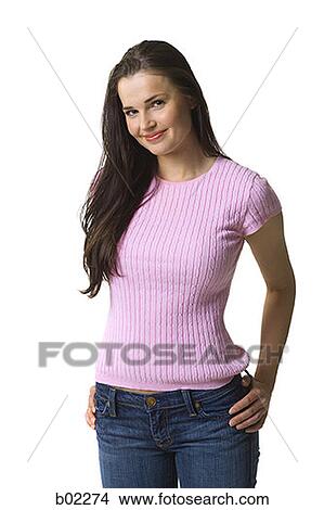 Young woman standing, facing camera View Large Photo Image Picture - Young woman standing, facing camera. Fotosearch