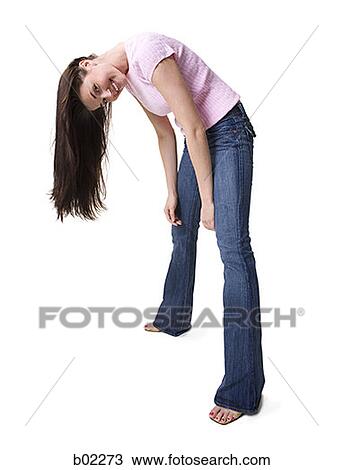 Young woman standing, with her head facing the ground View Large Photo Image Stock Image - Young woman standing, with her head facing the ground. Fotosearch