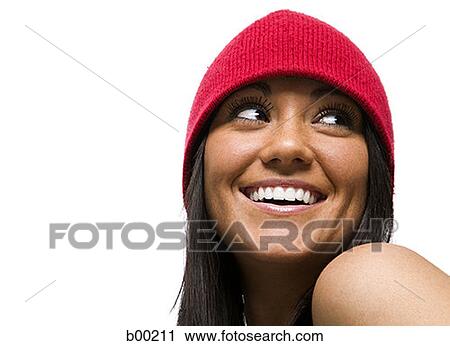 Young woman with a red hat View Large Photo Image Stock Image - Young woman with a red hat. Fotosearch
