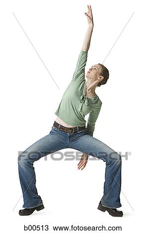 Young woman with her hand raised View Large Photo Image Stock Image - Young woman with her hand raised. Fotosearch