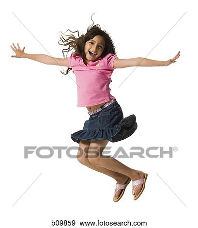 A girl jumping in mid-air View Large Photo Image Stock Photo - A girl jumping in mid-air. Fotosearch