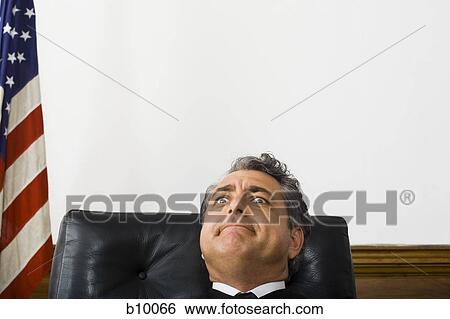 Stock Photograph - A male judge making a face. Fotosearch