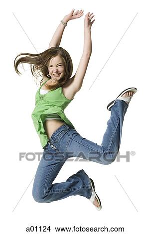 A teenage girl jumping View Large Photo Image Picture - A teenage girl jumping. Fotosearch