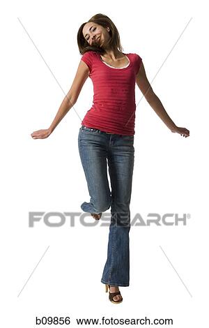 A teenage girl jumping View Large Photo Image Stock Photograph - A teenage girl jumping. Fotosearch