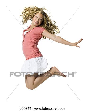 A teenage girl jumping View Large Photo Image Stock Photography - A teenage girl jumping. Fotosearch