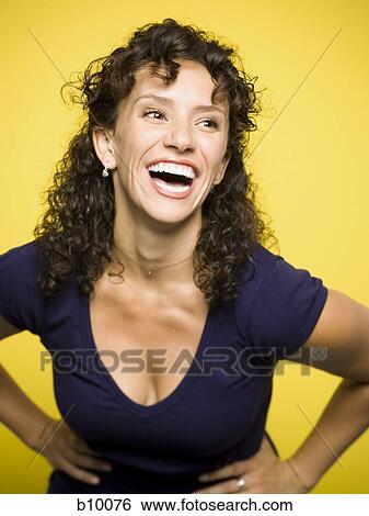 A young woman laughing View Large Photo Image Stock Photograph - A young woman laughing. Fotosearch