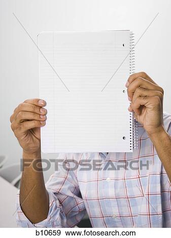 African American male student holding blank workbook View Large Photo Image Stock Photo - African American male student holding blank workbook. Fotosearch